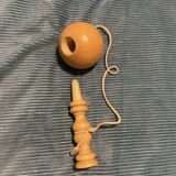 Vintage wooden cup-and-ball game