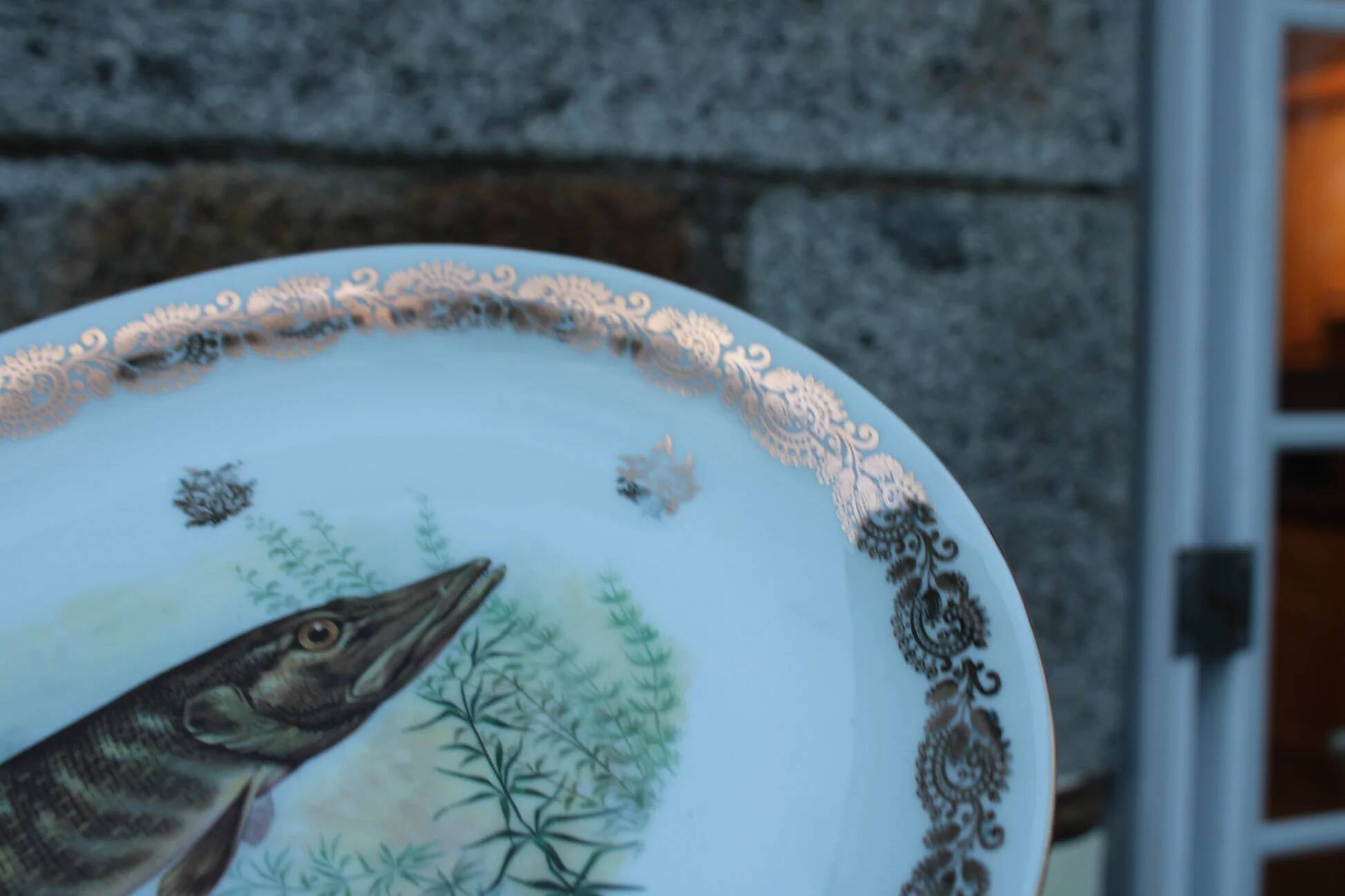 Large French porcelain dish L.C – Painted pike & gilded frieze