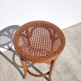 Old low caned bistro stool