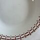 Presentation plate with a brown pattern