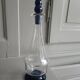 White and blue blown glass carafe