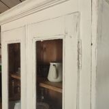 Patinated white bookcase