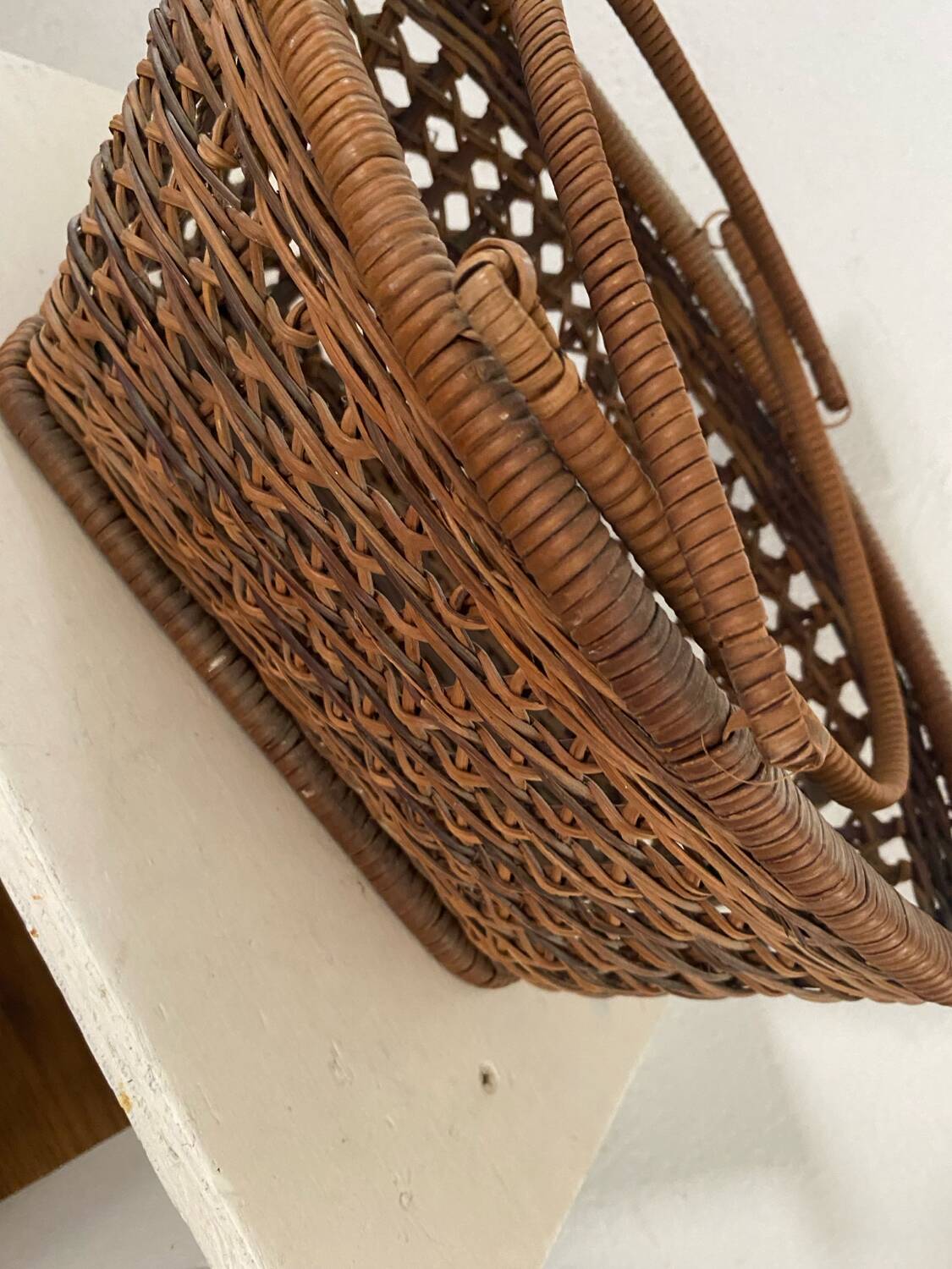 Vintage wicker and cane basket in bohemian style