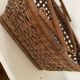 Vintage wicker and cane basket in bohemian style