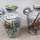 Pair of Marius Bessone vases, pitchers