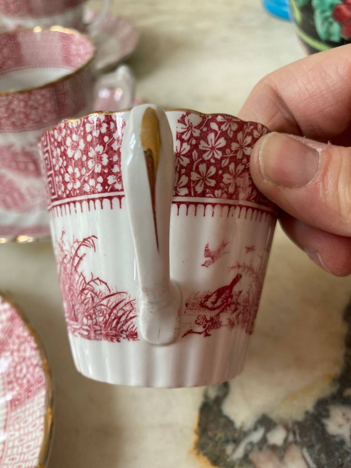 Set of 5 Lunéville “K and G” cups and saucers