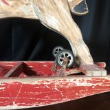 Cheval à bascule avec roulettes