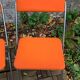 Framar orange felt folding chairs 1970