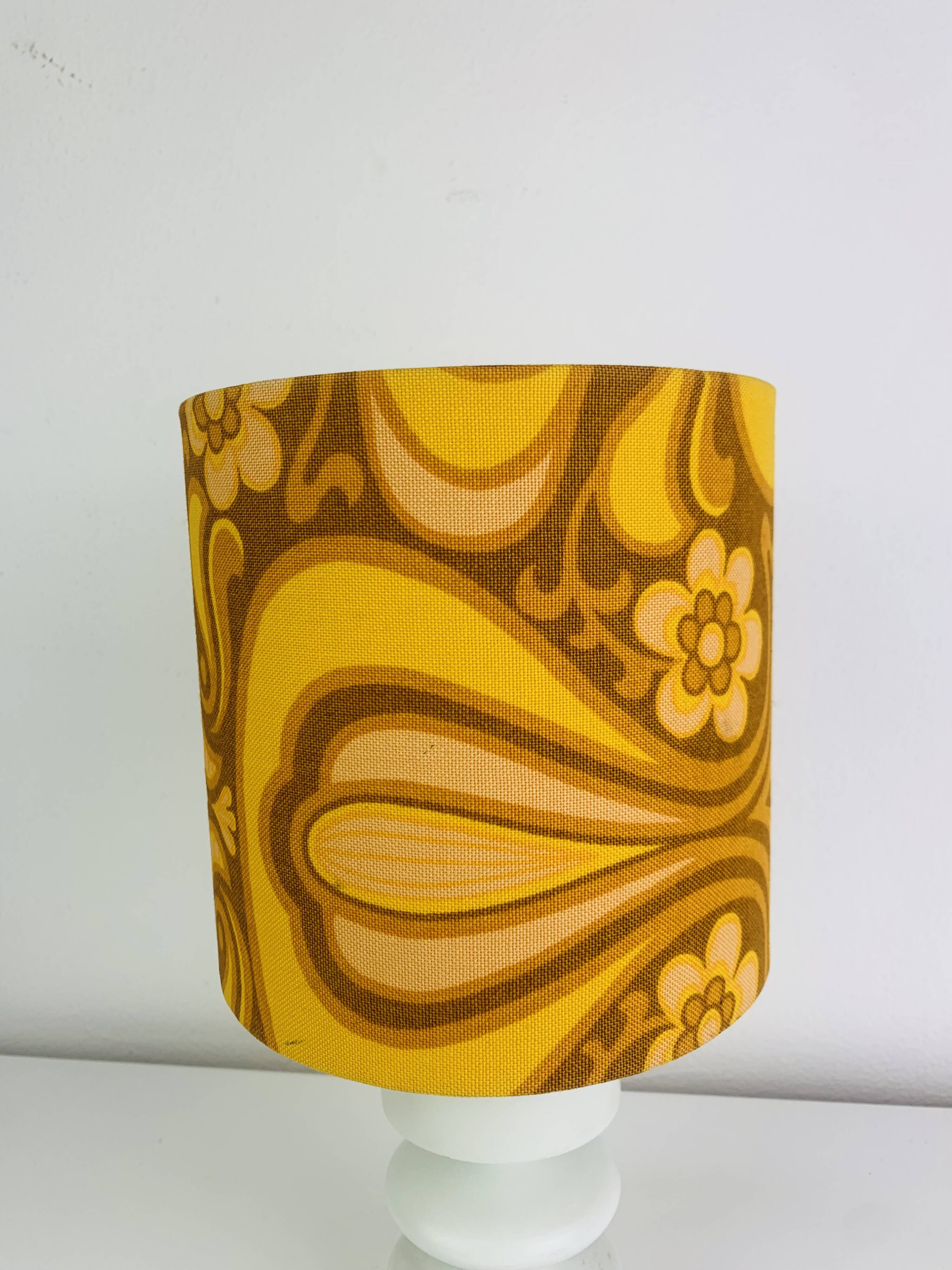 Temde lamp with turned wood and a seventies lampshade.