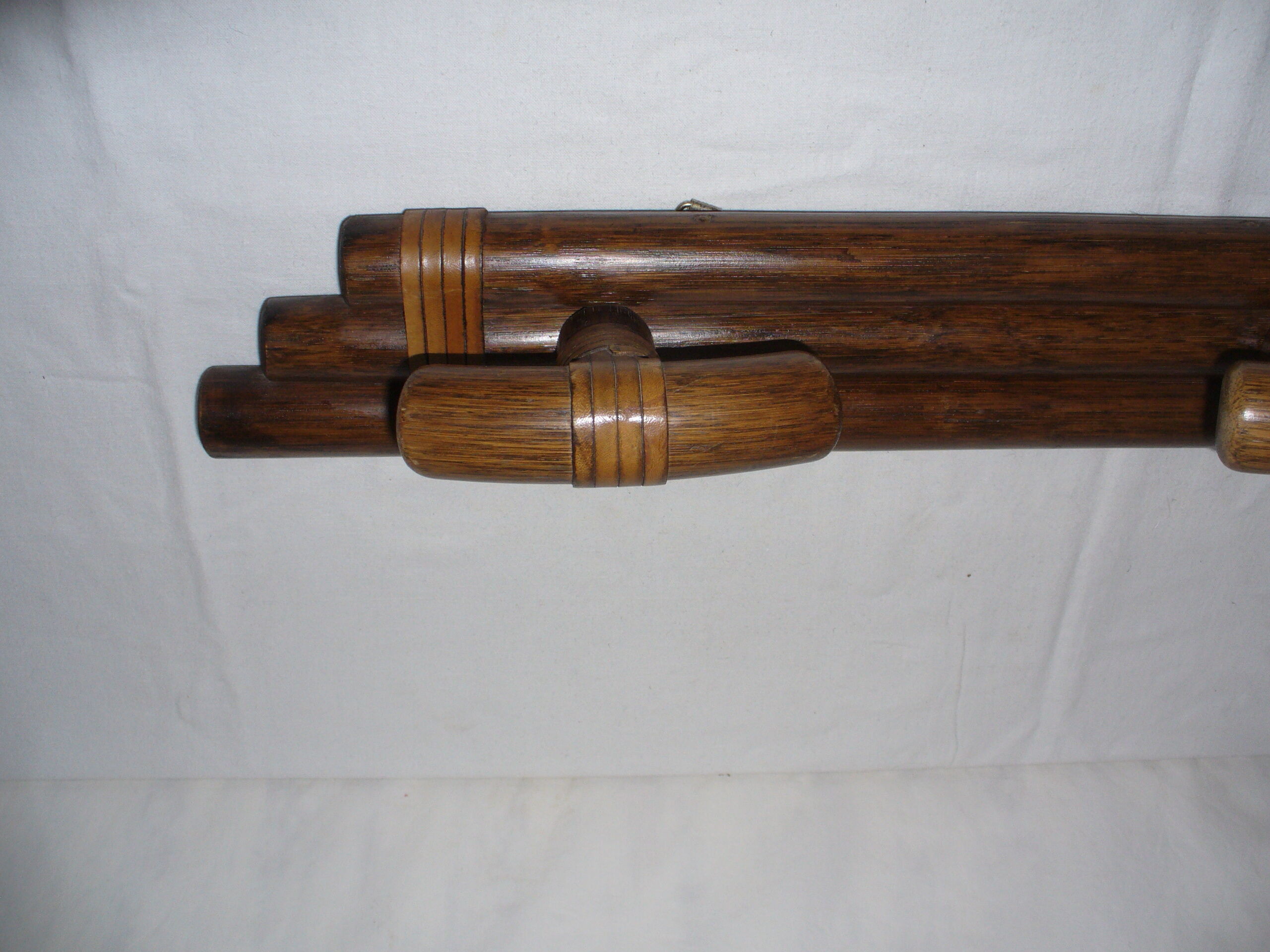 Leather and wood coat hanger