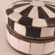Box with black and white stripes bones and vintage horn 80
