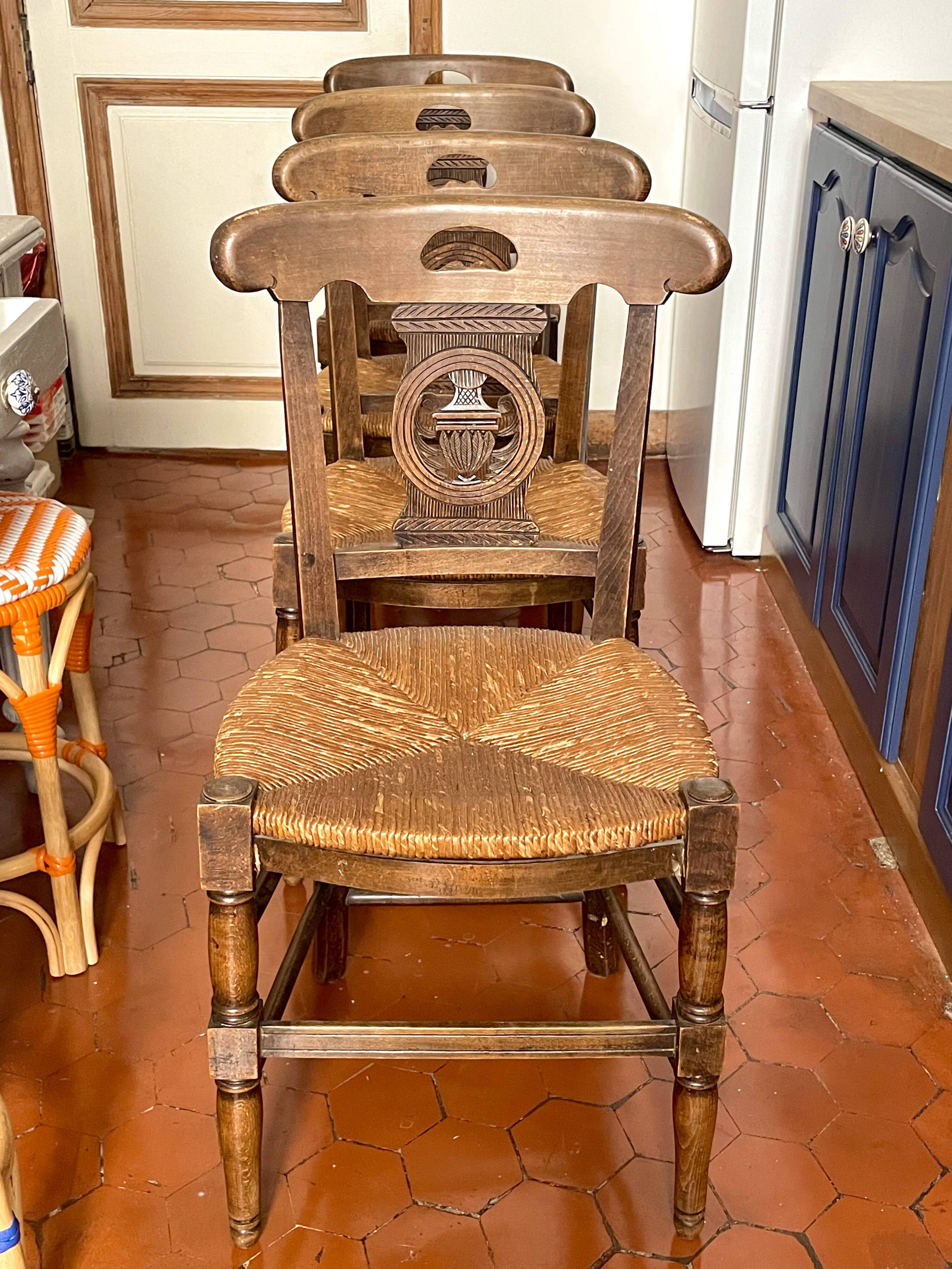 4 old Provencal chairs in carved wood