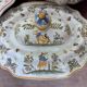 Important covered soup tureen and its stand in earthenware – Polychrome decoration