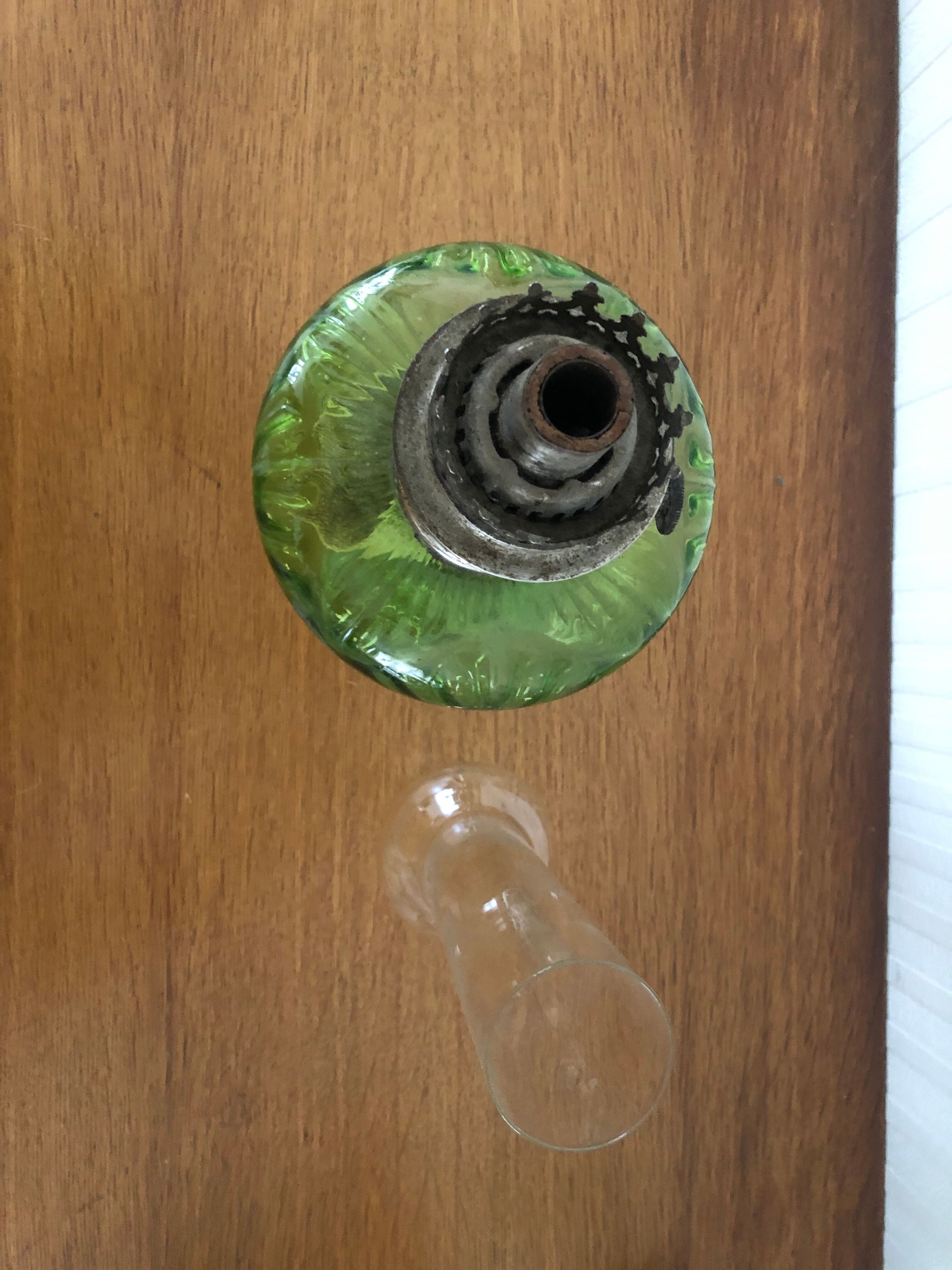 Antique oil lamp in glass and metal