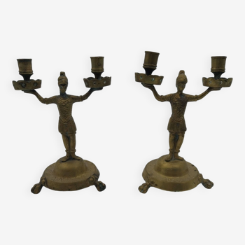 pair of bronze soldier candlesticks