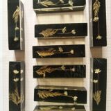 Knife holders in bakelite and gold leaf