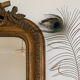 Miroir Louis Philippe patine doré et ornements
