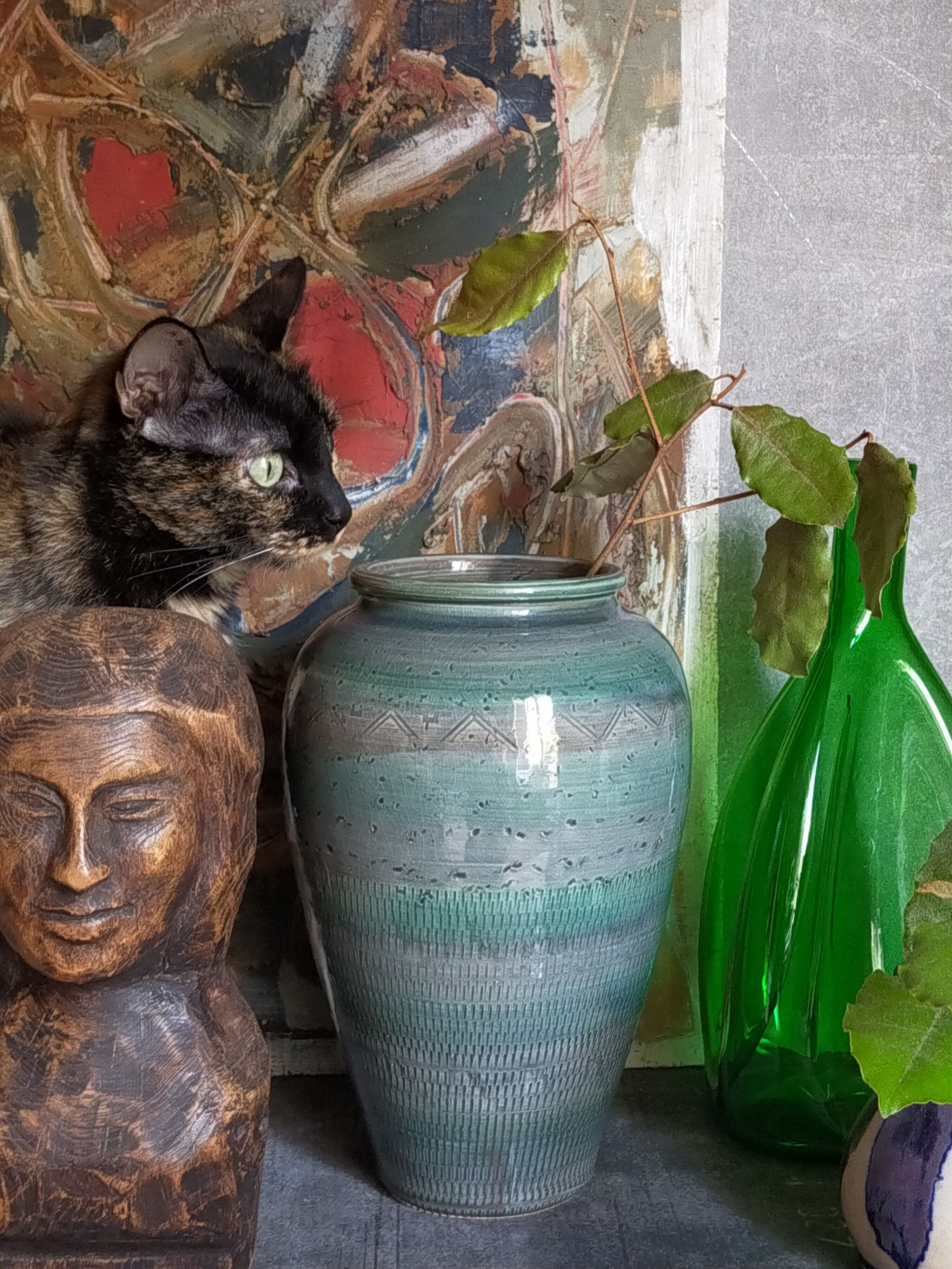 Oblong ceramic vase sacrificed with blue enamel