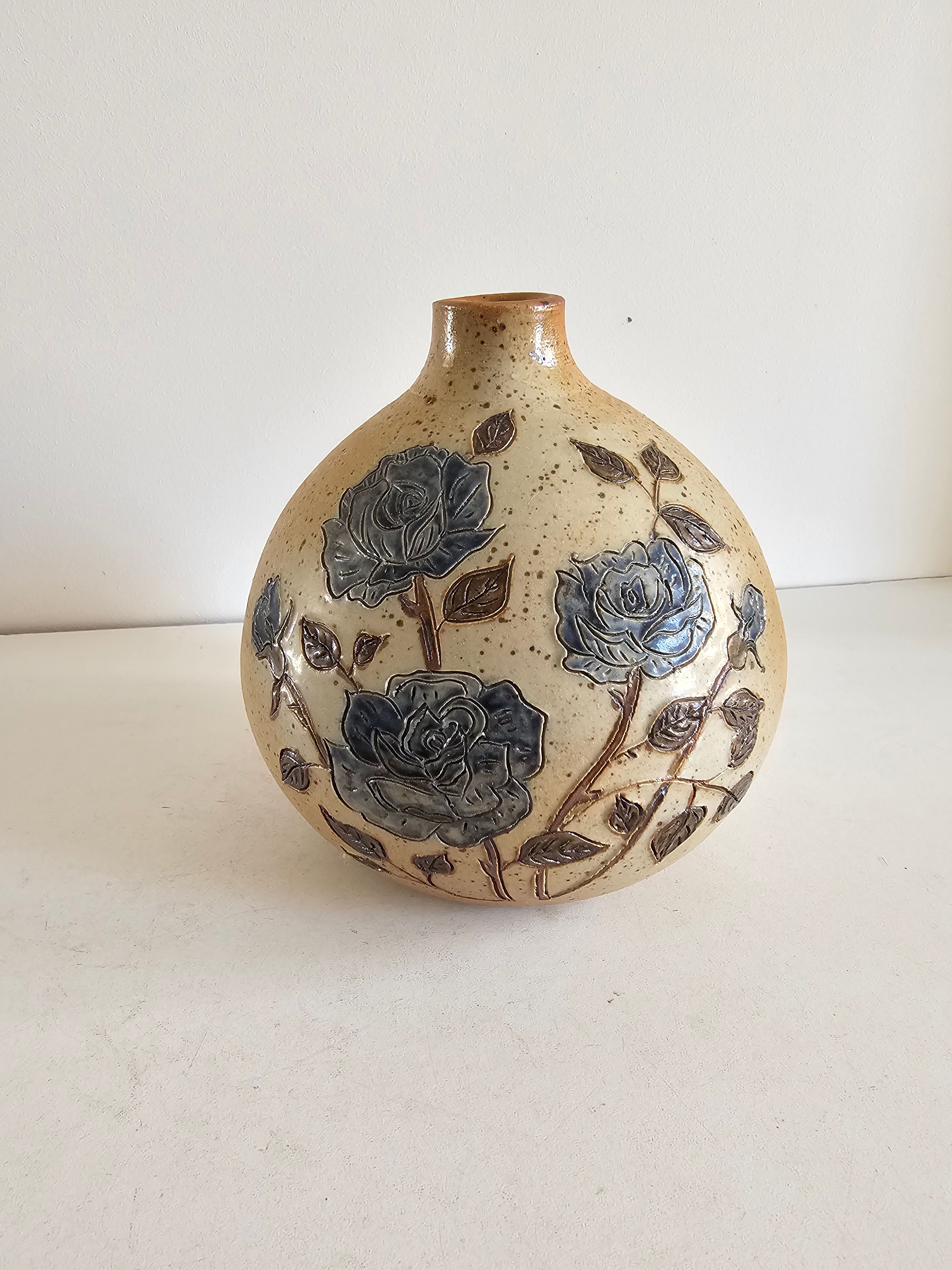Ceramic lamp base with floral pattern, signed.