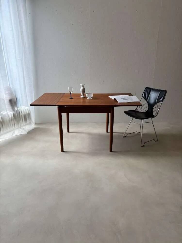 Scandinavian design dining table in solid teak from the 1960s.