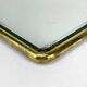 Old barber mirror in brass and beveled glass