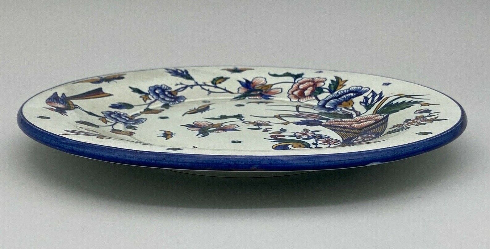 Plate gien with cornucopia decoration insect peacock butterfly