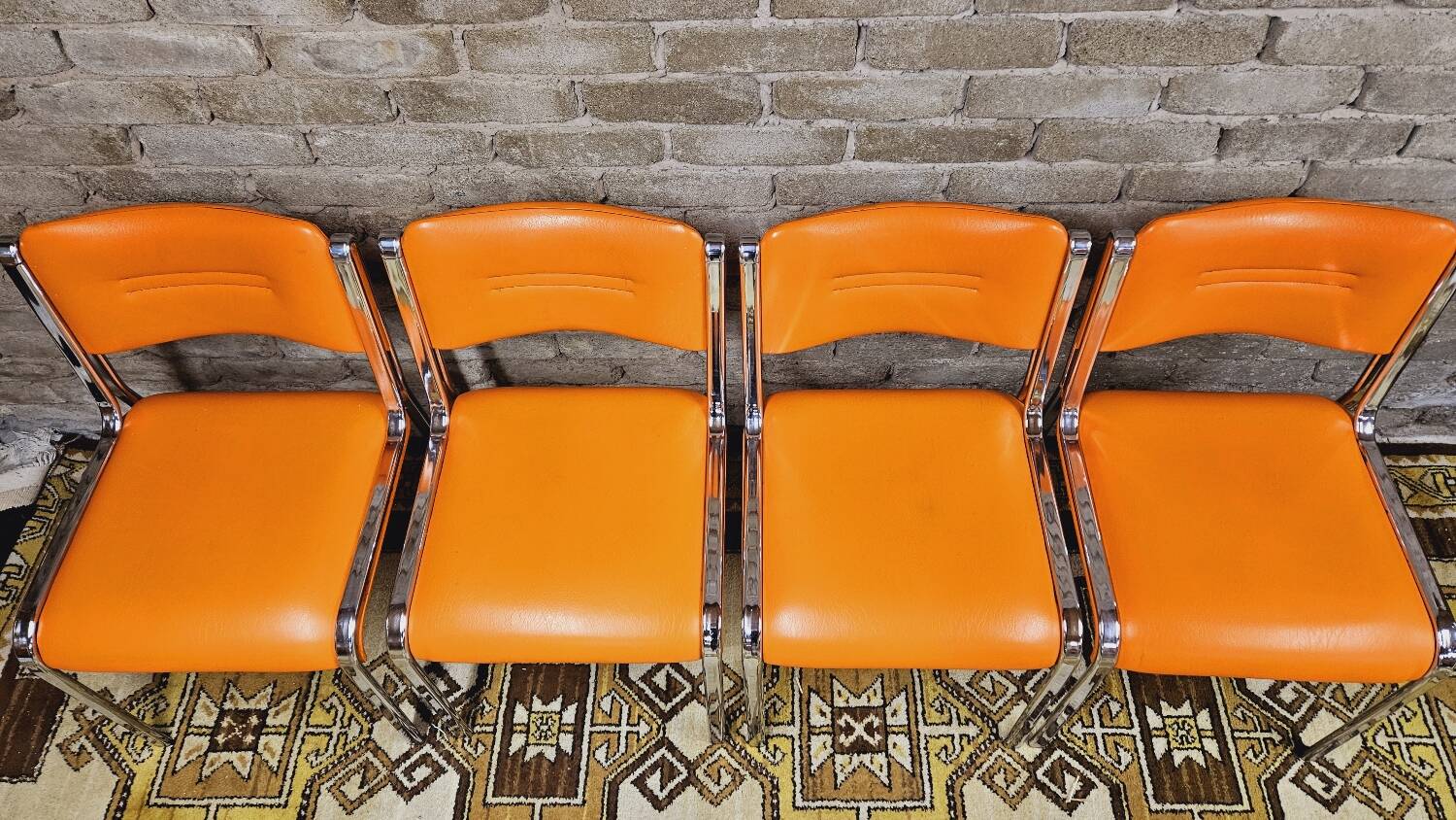 Set of 4 vintage chrome skai orange chairs 1970
