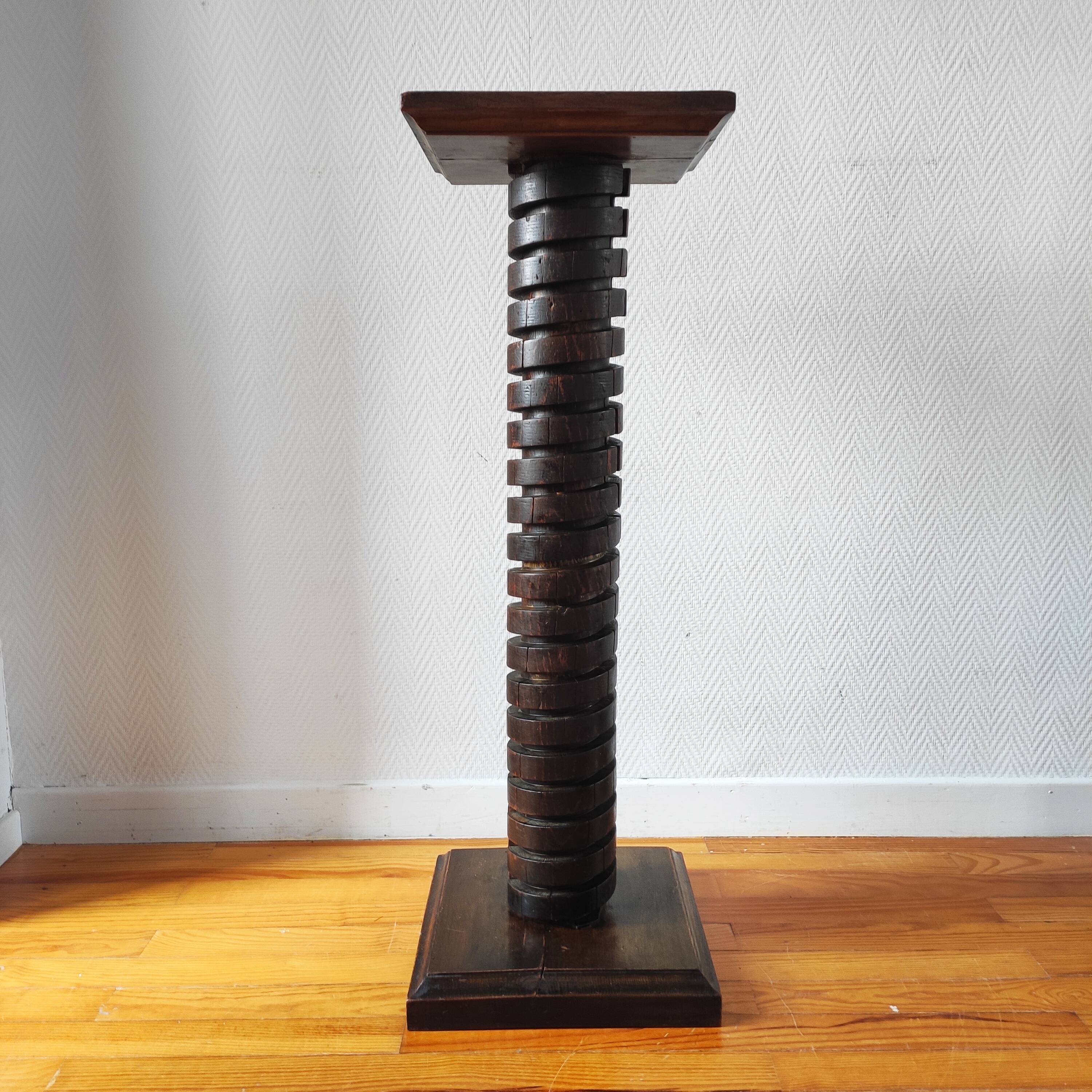 Brutalist column – old Burgundy press screw