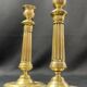 Pair of 19th century gilt bronze candlesticks with fluted shafts, Restoration