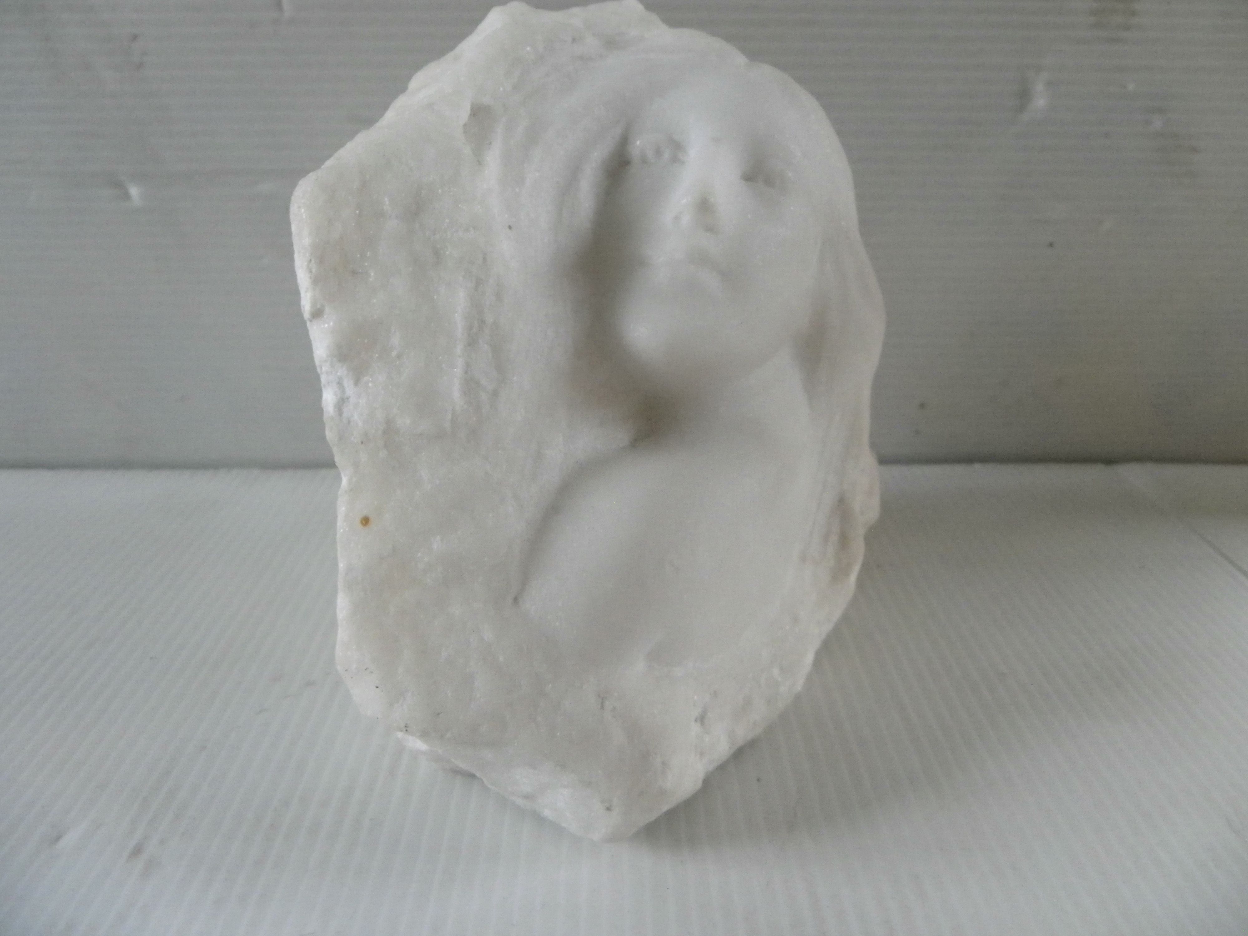 Sculpture face of woman in marble block 13 x 12 x 8 cm