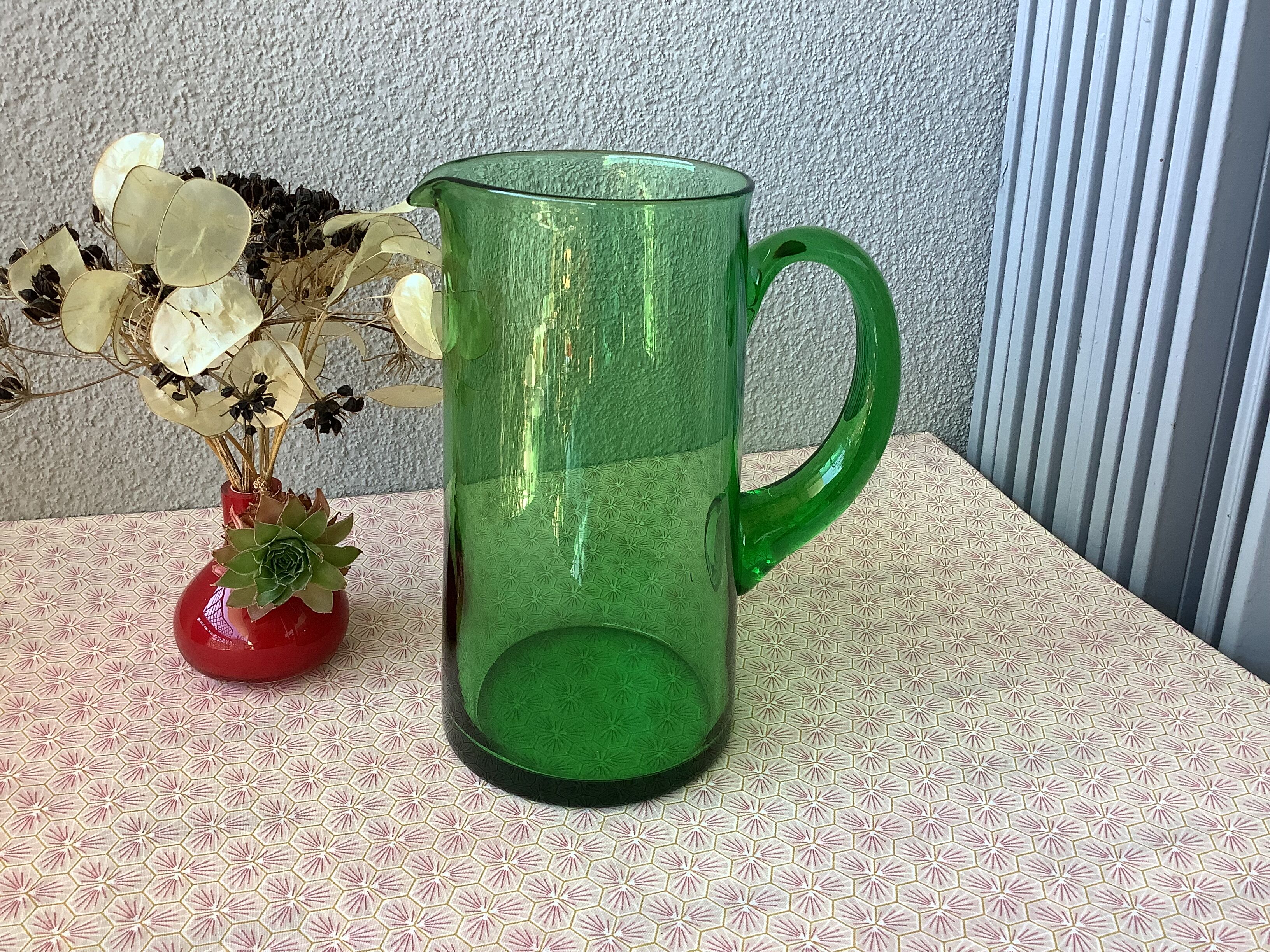 Green blown glass decanter