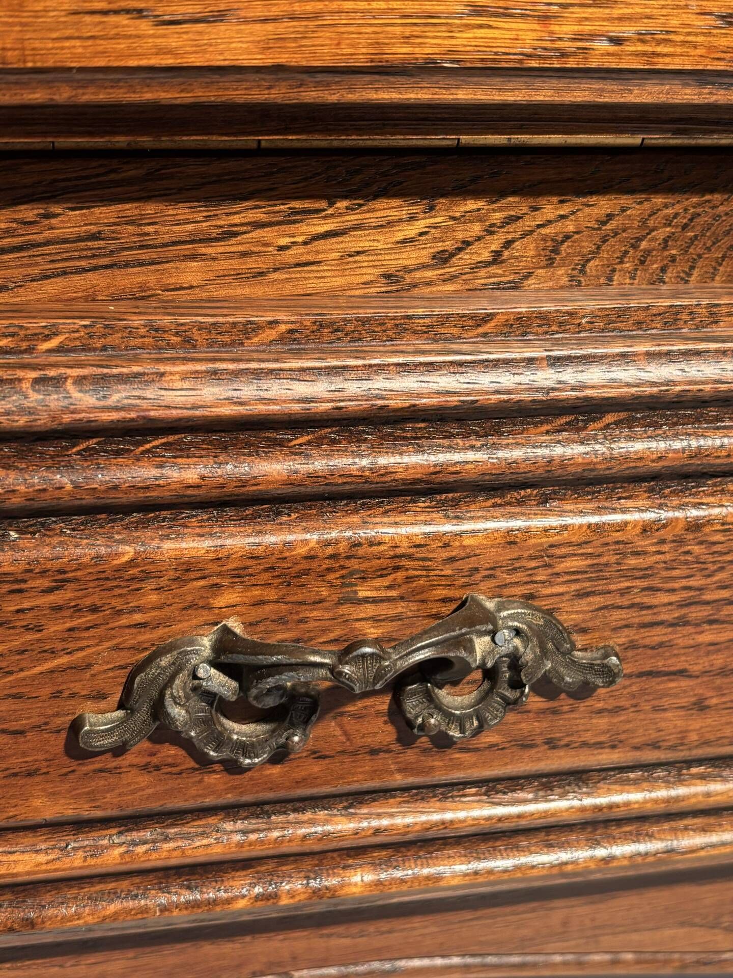 Louis XV style oak TV cabinet with drop-down flap.