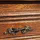 Louis XV style oak TV cabinet with drop-down flap.