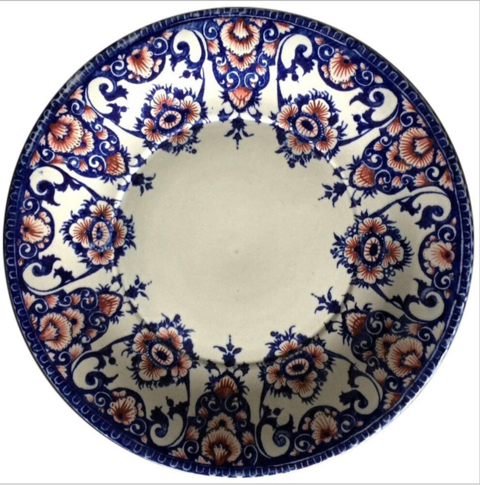 Plate in blue and red earthenware of Gien from the 19th century