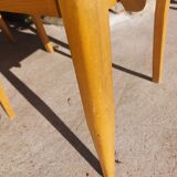 3 vintage bridge chairs with rounded armrests.