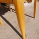 3 vintage bridge chairs with rounded armrests.