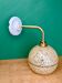 Vintage glass globe wall light in yellow and silver from Clichy.