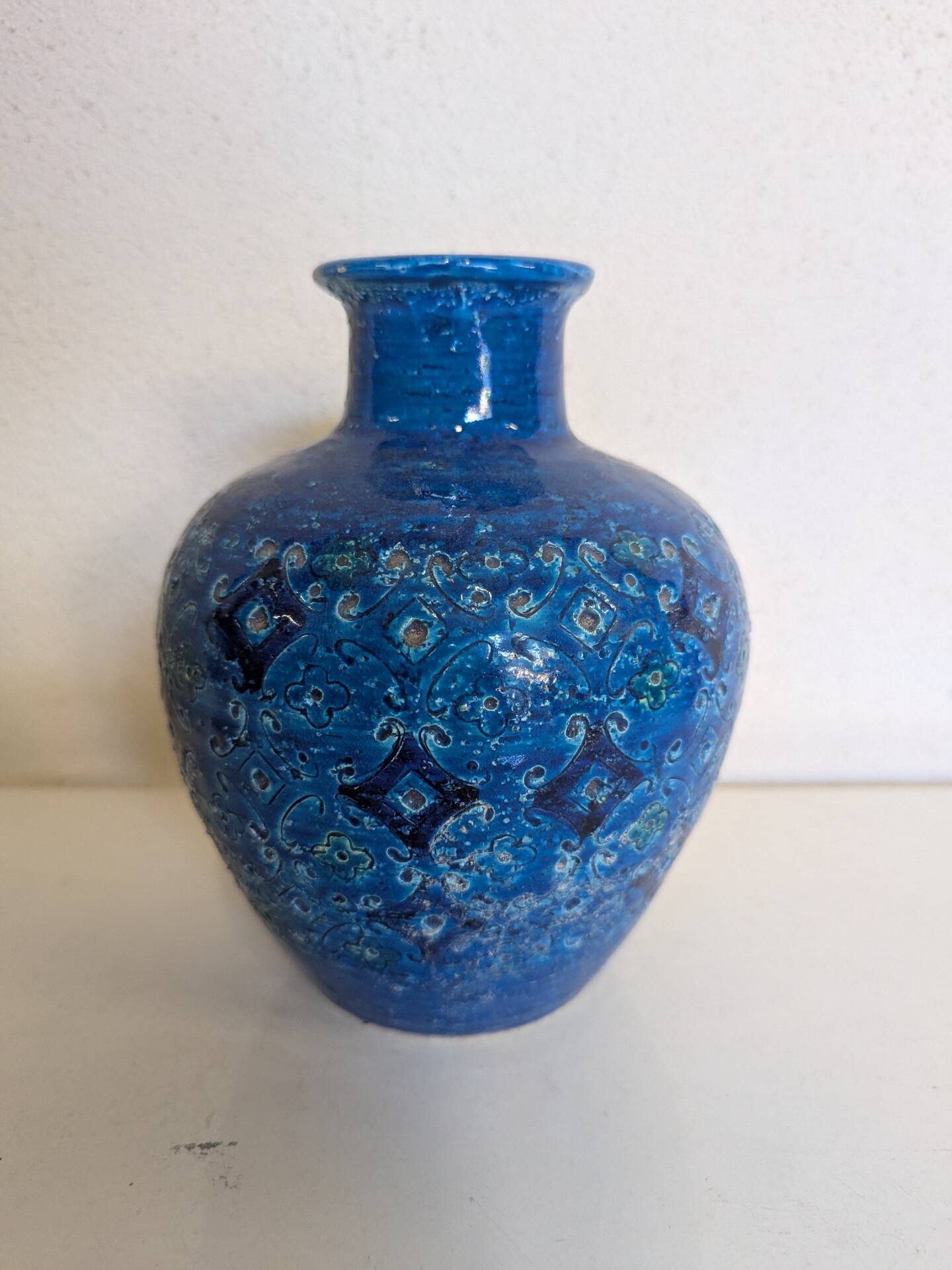 Vintage Italian vase in blue glazed ceramic, relief decoration.