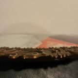 Italian oval frame in bronze and curved glass