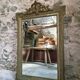 Large French mirror in Napoléon III style with a composition frame, circa 1880–1900.