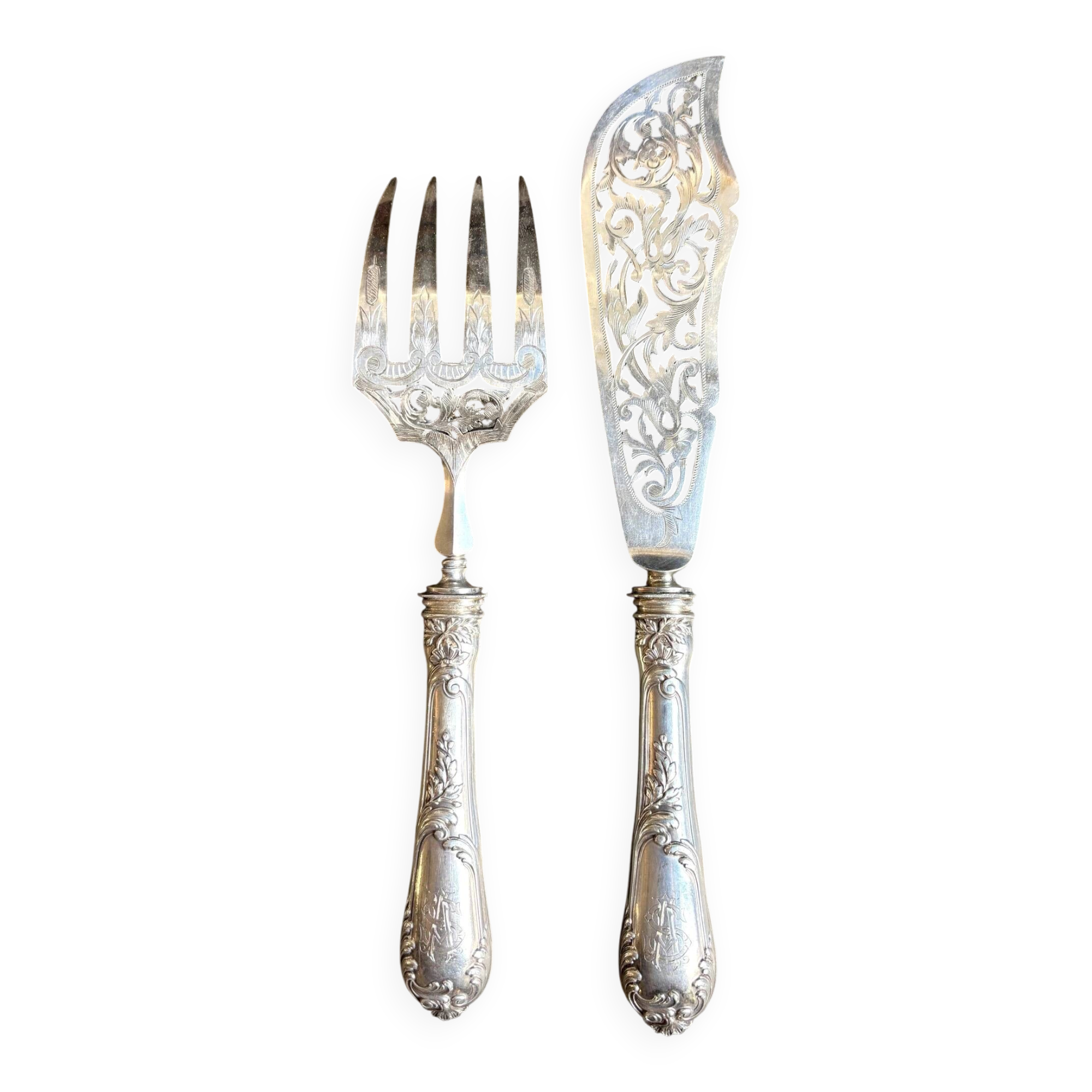 2 silver openwork service cutlery sets engraved with "AS"