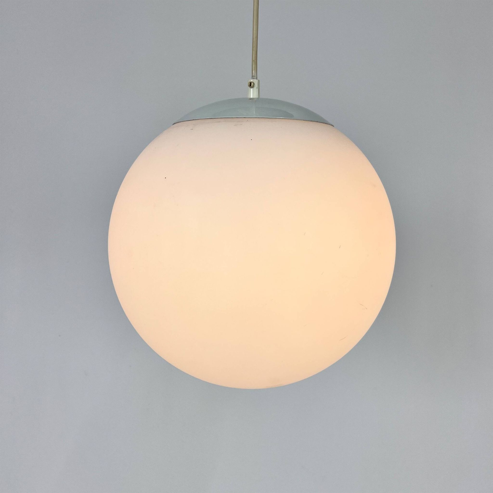 Vintage glass hanging ball lamp by hala zeist, 1960s