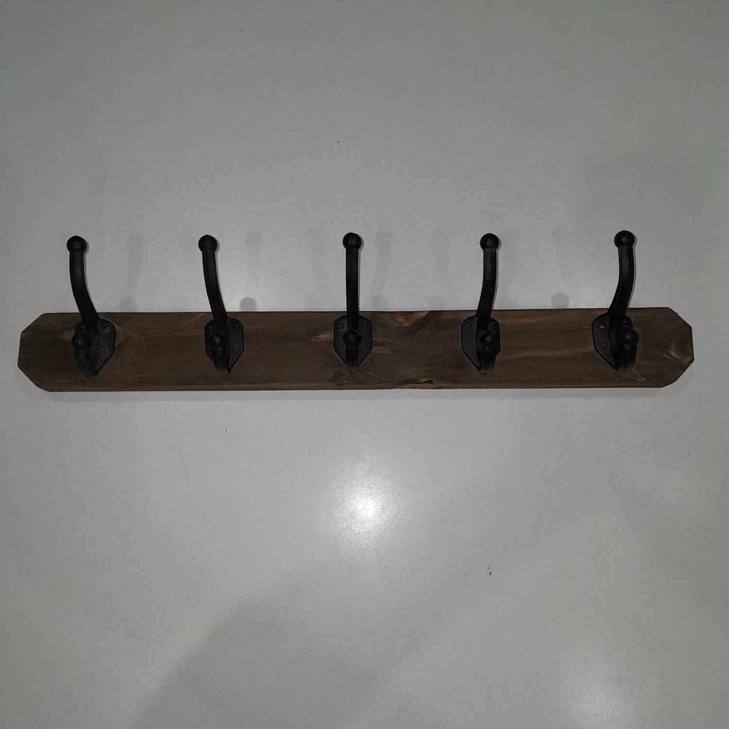 Vintage wooden coat rack with 5 double cast iron hooks