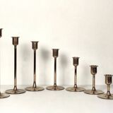Set of 7 brass candlesticks