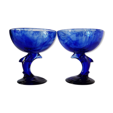 Set of 2 dolphin dessert cups in blue glass.