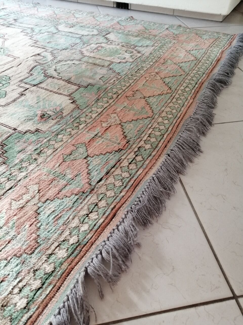 Afghan rug in pastel colors