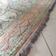 Afghan rug in pastel colors