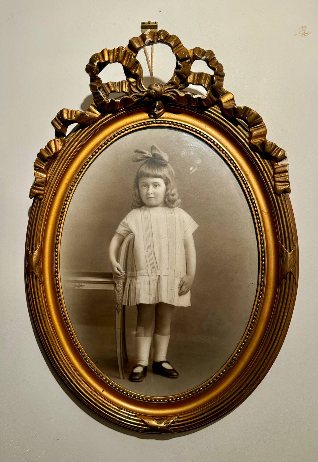 Old photograph, young girl with ribbon, 19th century