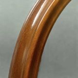 Old large oval wooden wall mirror