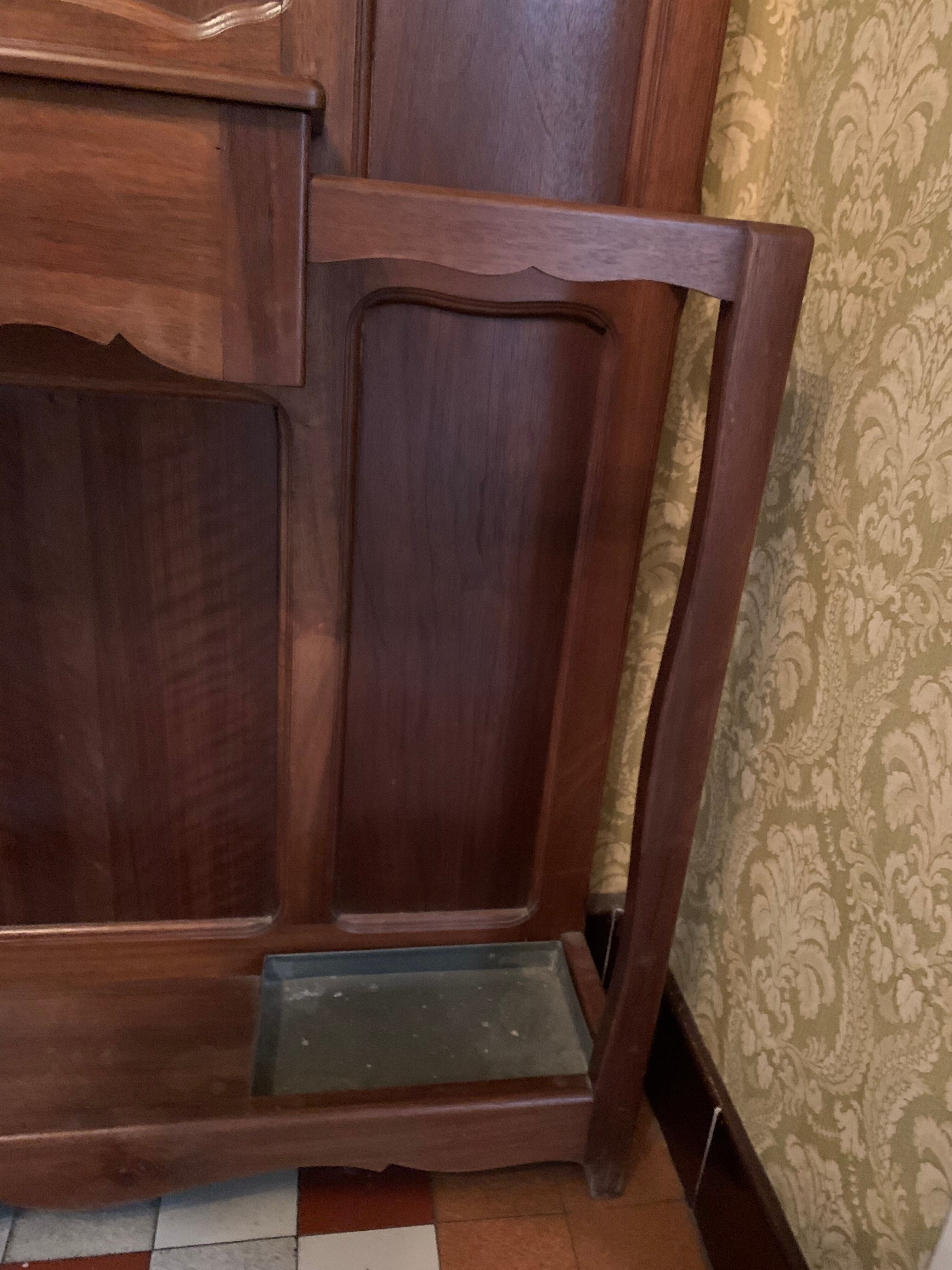 Cloakroom with walnut coat holder